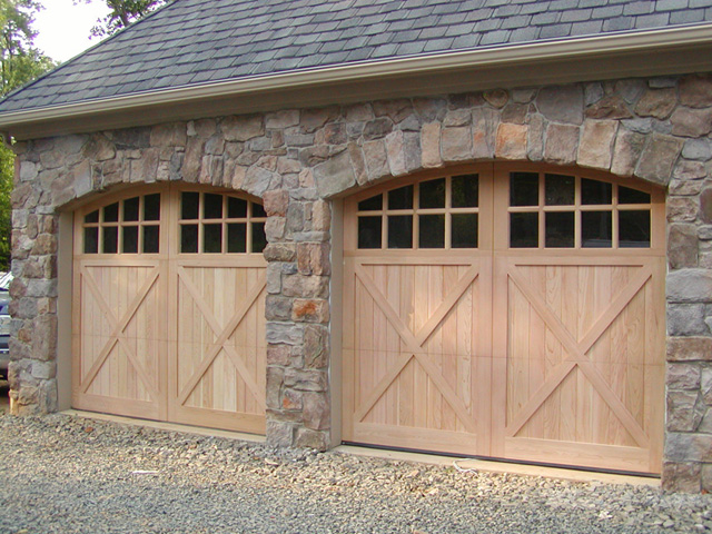 Stone garage with wooden doors